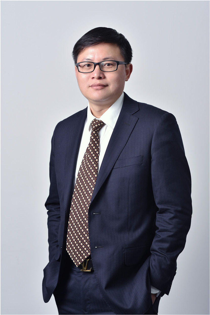 梁了春